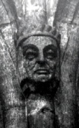 carved head at Astbury (14KB)