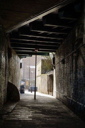 Backstreet under the Cambridge Heath railway bridge