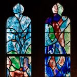 Window in the north aisle depicting Adam and Eve with the forbidden fruit