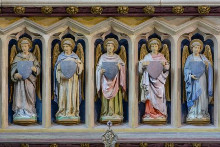 Angels at the base of the central panel